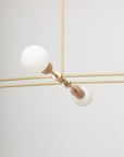 Oslo Six Sphere Dim to Warm Articulating Oak Pendant