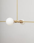 Oslo Six Sphere Dim to Warm Articulating Oak Pendant