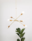 Oslo Six Sphere Dim to Warm Articulating Oak Pendant