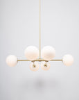 Six Matte Sphere Articulating Satin Brass Pendant