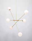 Six Matte Sphere Articulating Satin Brass Pendant