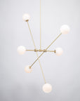 Six Matte Sphere Articulating Satin Brass Pendant