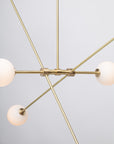 Six Matte Sphere Articulating Satin Brass Pendant