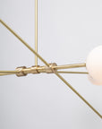 Six Matte Sphere Articulating Satin Brass Pendant