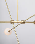 Six Matte Sphere Articulating Satin Brass Pendant