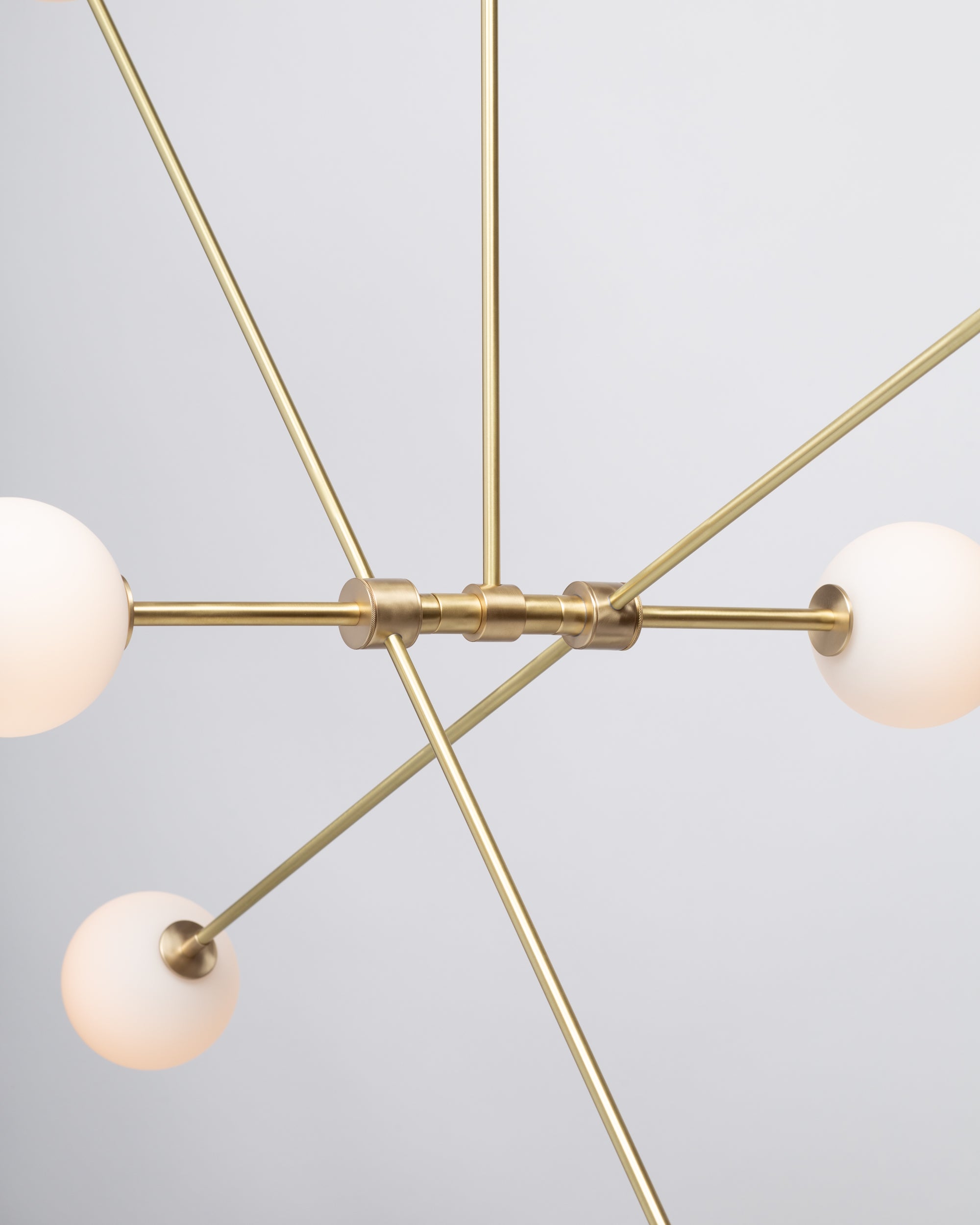 Six Matte Sphere Articulating Satin Brass Pendant