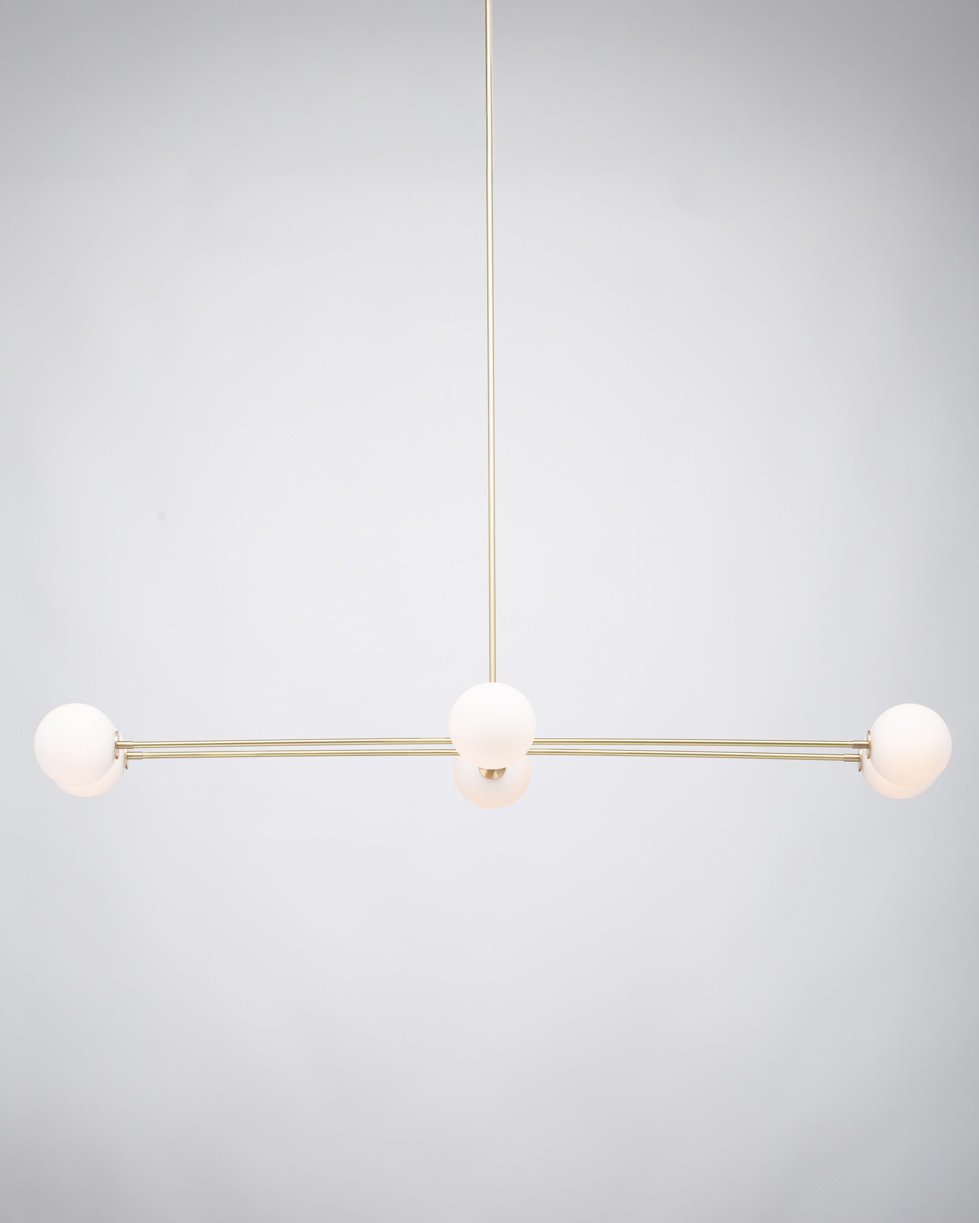 Six Matte Sphere Articulating Satin Brass Pendant