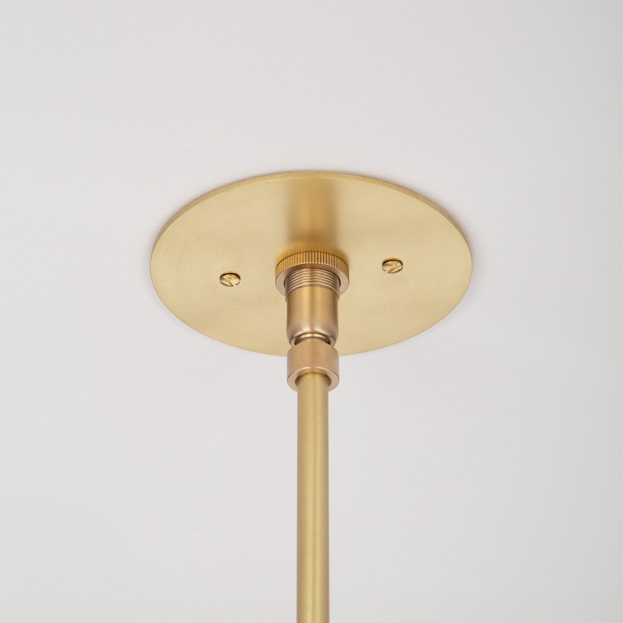 Six Matte Sphere Articulating Satin Brass Pendant